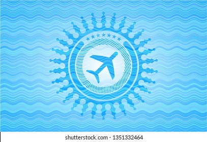 plane icon inside water representation emblem.