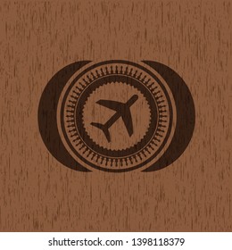 plane icon inside wood badge or emblem