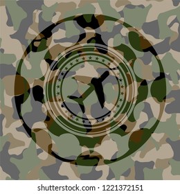 plane icon on camo pattern