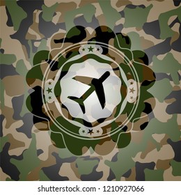 plane icon on camouflaged pattern