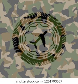 plane icon on camouflaged pattern