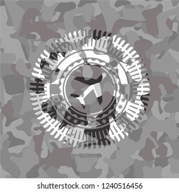 plane icon on grey camo texture