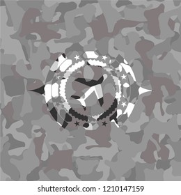 plane icon on grey camouflage pattern