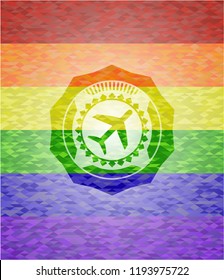 plane icon on mosaic background with the colors of the LGBT flag