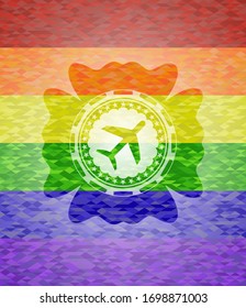 plane icon on mosaic background with the colors of the LGBT flag