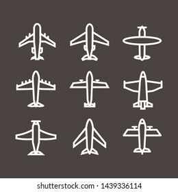 Plane icon,sign,pictogram,symbol  white set isolated on a brown  background  thin line or outline  style.Airplane silhouette,model plane.Fly and jet  collection