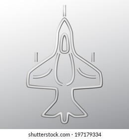 Plane out of steel wire with a gray background