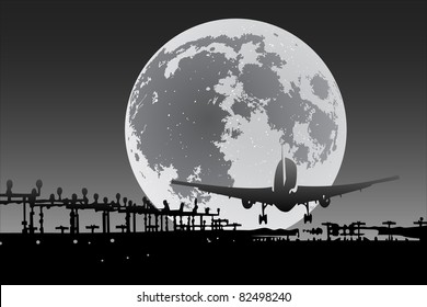 Plane silhouette with full moon on background