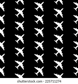 Plane symbol seamless pattern on black background. Vector illustration.