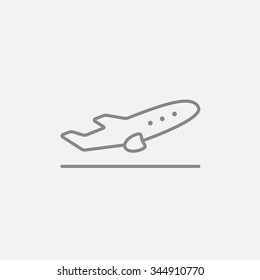 Plane taking off line icon for web, mobile and infographics. Vector dark grey icon isolated on light grey background.