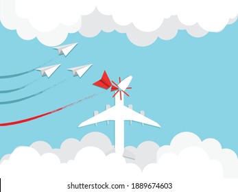 Planes coming out of the clouds collide. Passenger plane crashes into warplane. Cardboard plane colliding in the sky. Airplanes in the blue sky.