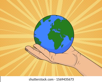 Planet Earth in the hands of man.  Pop Art vintage vector illustration