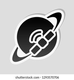 Planet and satellite, technology icon. Sticker style with white border and simple shadow on gray background