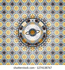 planet, saturn icon inside arabic style badge. Arabesque decoration.