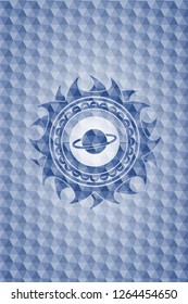 planet, saturn icon inside blue emblem with geometric pattern background.