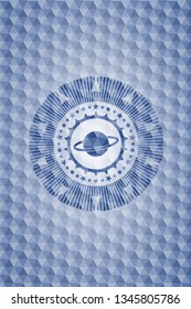 planet, saturn icon inside blue emblem with geometric pattern.