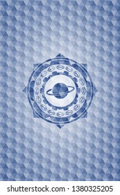 planet, saturn icon inside blue emblem with geometric pattern background.