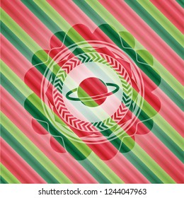 planet, saturn icon inside christmas colors style emblem.