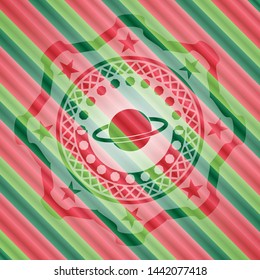planet, saturn icon inside christmas colors style emblem.