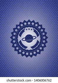 planet, saturn icon inside denim background