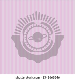 planet, saturn icon inside pink emblem