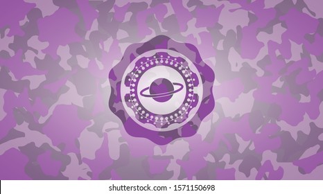 planet, saturn icon inside pink and purple camo emblem