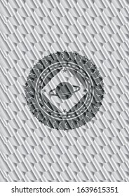 planet, saturn icon inside silver emblem or badge. Scales pattern. Vector Illustration. Detailed.