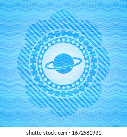 planet, saturn icon inside water wave emblem.