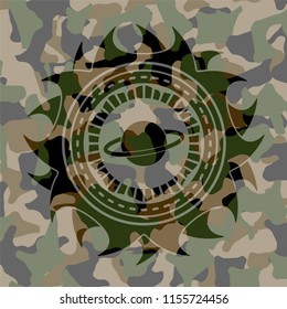 planet, saturn icon on camouflage pattern