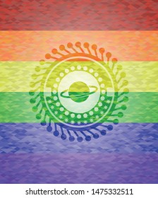 planet, saturn icon on mosaic background with the colors of the LGBT flag