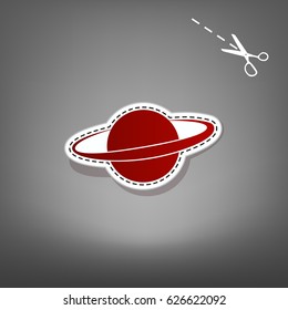 Planet in space sign. Vector. Red icon with for applique from paper with shadow on gray background with scissors.