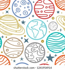 Planets. Hand drawn planets and stars seamless background.
Seamless color pattern with different planets and stars.