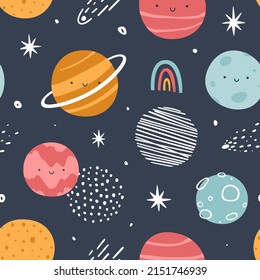 Planets with smiling faces in the space pattern. Space seamless vector print for baby textile and nursery fabric.