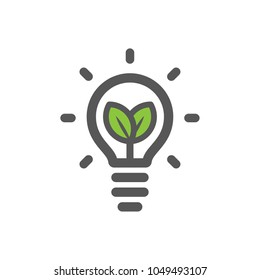Plant growing inside the light bulb vector icon