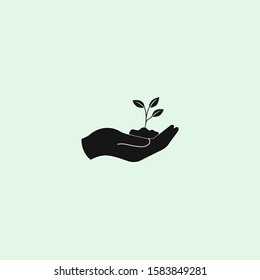 Plant in hand. Flat Vector icon