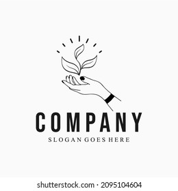 Plant in hand line vector. Hand holding plant with leaves vector outline sign.