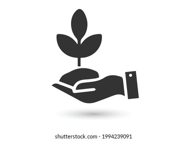 Plant in hand. Vector icon.