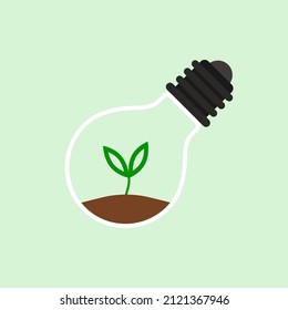 Plant in lamp icon vector. Eco logo design. Green eco energy concept, plant growing inside the light bulb.