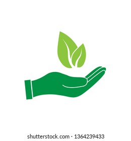 Plant leaf in hand icon. Vector illustration, flat design.
