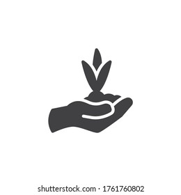 Icono de vector de planta a mano. signo plano relleno para concepto móvil y diseño web. Mano con icono de glifo de brote. Símbolo ecológico, ilustración del logotipo. Gráficos vectoriales
