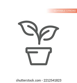 Planta en un icono vectorial de línea de olla. La jardinería y el crecimiento delinearon el símbolo.