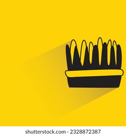 plant pot with shadow on yellow background
