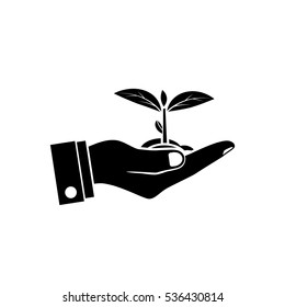 Planting sapling isolated icon on white background. Male farmer, gardener holding a green sprout in hand. Care and environmental development. Ecology concept. Vector illustration.