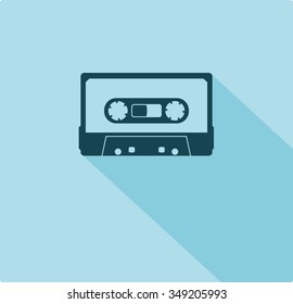 Plastic audio compact cassette tape - web icon. black color music tape. old technology concept, retro style, flat and shadow theme design, vector art image illustration, isolated on blue background