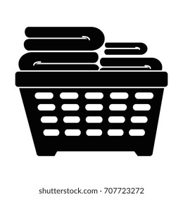 plastic basket with clothes