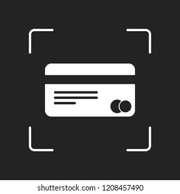 plastic credit card icon. White object in camera autofocus on dark background