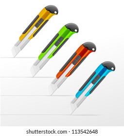 Plastic knives for the paper isolated
