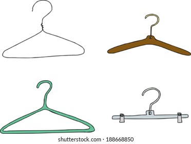 Plastic, metal and wooden clothes hangers over white background