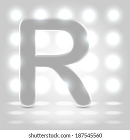 Plastic polished character capital R over enlighted background