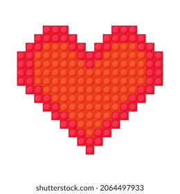 Plastic red heart on white background made of construction kit